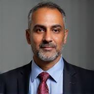 Professional headshot of Rajesh Kumar.
